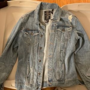 Distressed denim jacket size medium